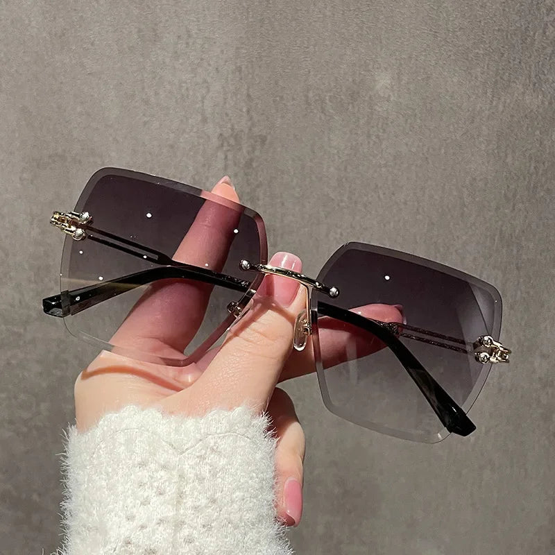 Lunettes de soleil femme sans monture - Gris